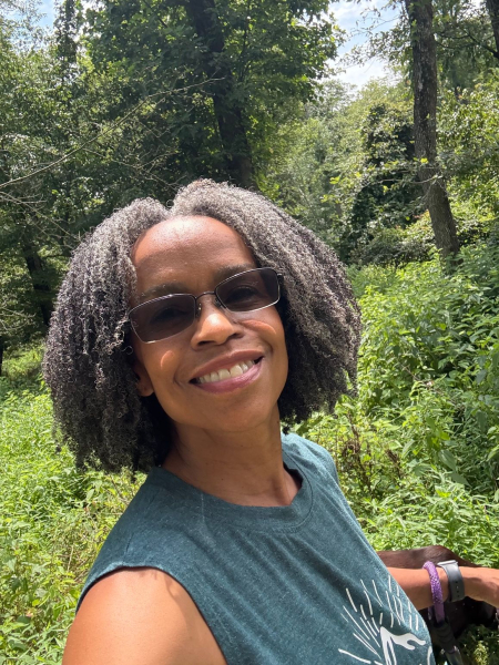 Black woman in her 60s wearing natural hair