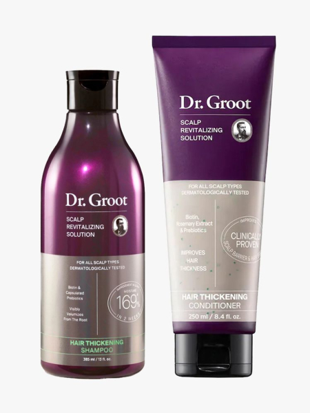 Dr. Groot Scalp Revitalizing Solution Shampoo and Conditioner in branded bottle and tube components on a light gray background